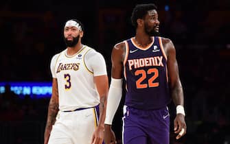 LOS ANGELES, CA - OCTOBER 10: Anthony Davis #3 of the Los Angeles Lakers and Deandre Ayton #22 of the Phoenix Suns look on during a preseason game on October 10, 2021 at STAPLES Center in Los Angeles, California. NOTE TO USER: User expressly acknowledges and agrees that, by downloading and/or using this Photograph, user is consenting to the terms and conditions of the Getty Images License Agreement. Mandatory Copyright Notice: Copyright 2021 NBAE (Photo by Adam Pantozzi/NBAE via Getty Images)