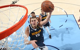 MEMPHIS, TN - NOVEMBER 1: Nikola Jokic #15 of the Denver Nuggets shoots against the Memphis Grizzlies on November 1, 2021 at FedExForum in Memphis, Tennessee. NOTE TO USER: User expressly acknowledges and agrees that, by downloading and or using this photograph, User is consenting to the terms and conditions of the Getty Images License Agreement. Mandatory Copyright Notice: Copyright 2021 NBAE (Photo by Joe Murphy/NBAE via Getty Images)