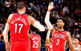 PHOENIX, AZ - NOVEMBER 2: Josh Hart #3 of the New Orleans Pelicans high fives Jonas Valanciunas #17 of the New Orleans Pelicans during the game against the Phoenix Suns on November 2, 2021 at Footprint Center in Phoenix, Arizona. NOTE TO USER: User expressly acknowledges and agrees that, by downloading and or using this photograph, user is consenting to the terms and conditions of the Getty Images License Agreement. Mandatory Copyright Notice: Copyright 2021 NBAE (Photo by Barry Gossage/NBAE via Getty Images)