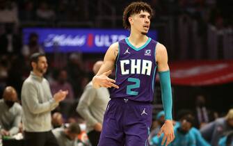 LOS ANGELES, CALIFORNIA - NOVEMBER 07: LaMelo Ball #2 of the Charlotte Hornets reacts to a play during the first quarter against the Los Angeles Clippers at Staples Center on November 07, 2021 in Los Angeles, California. NOTE TO USER: User expressly acknowledges and agrees that, by downloading and or using this photograph, User is consenting to the terms and conditions of the Getty Images License Agreement. (Photo by Katelyn Mulcahy/Getty Images)