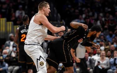 DENVER, CO - NOVEMBER 8: Nikola Jokic (15) of the Denver Nuggets hits Markieff Morris (8) of the Miami Heat with a retaliatory blow after Morris bumped Jokic near mid court during the fourth quarter of Denver"u2019s 113-96 win on Monday, November 8, 2021. The altercation resulted in an ejection for Jokic and a flagrant and two for Morris. (Photo by AAron Ontiveroz/MediaNews Group/The Denver Post via Getty Images)
