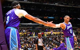 1236531426 LOS ANGELES, CA - NOVEMBER 12: Anthony Davis #3 of the Los Angeles Lakers high fives Russell Westbrook #0 of the Los Angeles Lakers during the game against the Minnesota Timberwolves on November 12, 2021 at STAPLES Center in Los Angeles, California. NOTE TO USER: User expressly acknowledges and agrees that, by downloading and/or using this Photograph, user is consenting to the terms and conditions of the Getty Images License Agreement. Mandatory Copyright Notice: Copyright 2021 NBAE (Photo by Adam Pantozzi/NBAE via Getty Images)