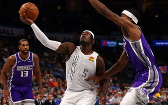 1236530372 OKLAHOMA CITY, OK - NOVEMBER 12: Luguentz Dort #5 of the Oklahoma City Thunder drives to the basket against the Sacramento Kings on November 12, 2021 at Chesapeake Energy Arena in Oklahoma City, Oklahoma. NOTE TO USER: User expressly acknowledges and agrees that, by downloading and or using this photograph, User is consenting to the terms and conditions of the Getty Images License Agreement. Mandatory Copyright Notice: Copyright 2021 NBAE (Photo by Zach Beeker/NBAE via Getty Images)