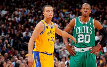 OAKLAND, CA - FEBRUARY 22: Stephen Curry #30 of the Golden State Warriors and Ray Allen #20 of the Boston Celtics stand on the court during the game on February 22, 2011 at Oracle Arena in Oakland, California. NOTE TO USER: User expressly acknowledges and agrees that, by downloading and/or using this Photograph, user is consenting to the terms and conditions of the Getty Images License Agreement. Mandatory Copyright Notice: Copyright 2011 NBAE (Photo by Rocky Widner/NBAE via Getty Images)