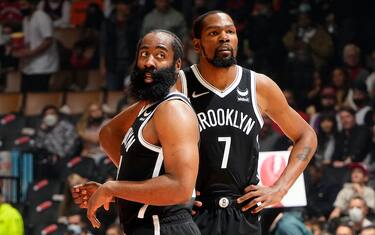 TORONTO, CANADA - NOVEMBER 7:  James Harden #13 and Kevin Durant #7 of the Brooklyn Nets during the game against the Toronto Raptors on November 7, 2021 at the Scotiabank Arena in Toronto, Ontario, Canada. NOTE TO USER: User expressly acknowledges and agrees that, by downloading and or using this Photograph, user is consenting to the terms and conditions of the Getty Images License Agreement. Mandatory Copyright Notice: Copyright 2021 NBAE (Photo by Mark Blinch/NBAE via Getty Images)