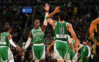 BOSTON, MA - NOVEMBER 19: Marcus Smart #36 of the Boston Celtics, Dennis Schroder #71 of the Boston Celtics, and Jayson Tatum #0 of the Boston Celtics react during a game against the Los Angeles Lakers on November 19, 2021 at TD Garden in Boston, Massachusetts. NOTE TO USER: User expressly acknowledges and agrees that, by downloading and/or using this Photograph, user is consenting to the terms and conditions of the Getty Images License Agreement. Mandatory Copyright Notice: Copyright 2021 NBAE (Photo by Jesse D. Garrabrant/NBAE via Getty Images) 
