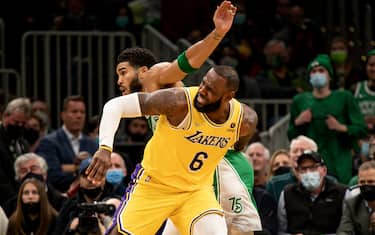 BOSTON, MASSACHUSETTS - NOVEMBER 19: Jayson Tatum #0 of the Boston Celtics and LeBron James #6 of the Los Angeles Lakers collide during a game at TD Garden on November 19, 2021 in Boston, Massachusetts. NOTE TO USER: User expressly acknowledges and agrees that, by downloading and or using this photograph, User is consenting to the terms and conditions of the Getty Images License Agreement. (Photo by Maddie Malhotra/Getty Images)