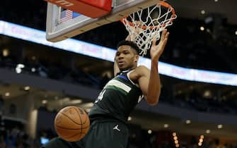 MILWAUKEE, WISCONSIN - NOVEMBER 20: Giannis Antetokounmpo #34 of the Milwaukee Bucks scores on a dunk during the second half of the game against the Orlando Magic at Fiserv Forum on November 20, 2021 in Milwaukee, Wisconsin. NOTE TO USER: User expressly acknowledges and agrees that, by downloading and or using this photograph, User is consenting to the terms and conditions of the Getty Images License Agreement. (Photo by John Fisher/Getty Images)