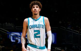 ORLANDO, FL - NOVEMBER 24: LaMelo Ball #2 of the Charlotte Hornets looks on during the game against the Orlando Magic on November 24, 2021 at Amway Center in Orlando, Florida. NOTE TO USER: User expressly acknowledges and agrees that, by downloading and or using this photograph, User is consenting to the terms and conditions of the Getty Images License Agreement. Mandatory Copyright Notice: Copyright 2021 NBAE (Photo by Fernando Medina/NBAE via Getty Images)
