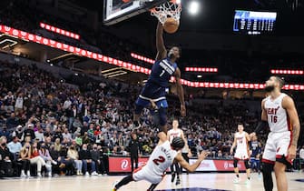 MINNEAPOLIS, MN -  NOVEMBER 24: (DUNK SEQUENCE four of four) Anthony Edwards #1 of the Minnesota Timberwolves dunks the ball during the game against the Miami Heat on November 24, 2021 at Target Center in Minneapolis, Minnesota. NOTE TO USER: User expressly acknowledges and agrees that, by downloading and or using this Photograph, user is consenting to the terms and conditions of the Getty Images License Agreement. Mandatory Copyright Notice: Copyright 2021 NBAE (Photo by David Sherman/NBAE via Getty Images)