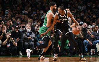 BOSTON, MA - NOVEMBER 24: Jayson Tatum #0 of the Boston Celtics plays defense on Kevin Durant #7 of the Brooklyn Nets during the game on November 24, 2021 at the TD Garden in Boston, Massachusetts.  NOTE TO USER: User expressly acknowledges and agrees that, by downloading and or using this photograph, User is consenting to the terms and conditions of the Getty Images License Agreement. Mandatory Copyright Notice: Copyright 2021 NBAE  (Photo by Brian Babineau/NBAE via Getty Images) 