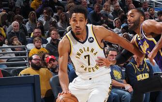 INDIANAPOLIS, IN - NOVEMBER 24: Malcolm Brogdon #7 of the Indiana Pacers drives to the basket against the Los Angeles Lakers on November 24, 2021 at Gainbridge Fieldhouse in Indianapolis, Indiana. NOTE TO USER: User expressly acknowledges and agrees that, by downloading and or using this Photograph, user is consenting to the terms and conditions of the Getty Images License Agreement. Mandatory Copyright Notice: Copyright 2021 NBAE (Photo by Ron Hoskins/NBAE via Getty Images)