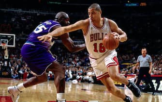 CHICAGO - JUNE 1: Bison Dele #18 (formerly known as Brian Williams) of the Chicago Bulls drives to the basket against the Utah Jazz during game 1 of the 1997 NBA Finals in Chicago, IL on June 1, 1997.  NOTE TO USER: User expressly acknowledges  and agrees that, by downloading and or using this  photograph, User is consenting to the terms and conditions of the Getty Images License Agreement.  (Photo by Nathaniel S. Butler/ NBAE/ Getty Images) 