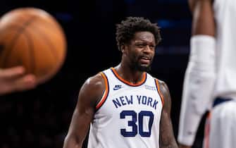 NEW YORK, NEW YORK - NOVEMBER 30: Julius Randle #30 of the New York Knicks reacts during the game against the Brooklyn Nets at Barclays Center on November 30, 2021 in the Brooklyn borough of New York City. NOTE TO USER: User expressly acknowledges and agrees that, by downloading and or using this photograph, User is consenting to the terms and conditions of the Getty Images License Agreement. (Photo by Michelle Farsi/Getty Images)