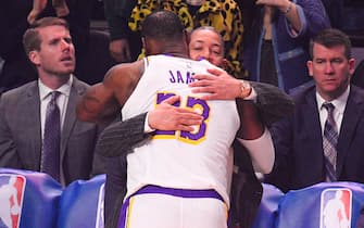 LOS ANGELES, CA - MARCH 08: Los Angeles Lakers Forward LeBron James (23) hugs Los Angeles Clippers assistant coach Tyronn Lue before a NBA game between the Los Angeles Lakers and the Los Angeles Clippers on March 8, 2020 at STAPLES Center in Los Angeles, CA. (Photo by Brian Rothmuller/Icon Sportswire via Getty Images)