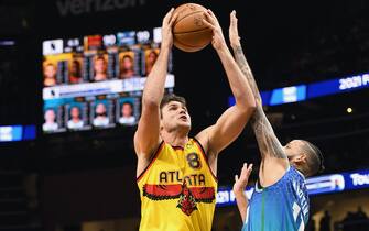 ATLANTA, GA - DECEMBER 5: Danilo Gallinari #8 of the Atlanta Hawks shoots the ball during the game against the Charlotte Hornets on December 5, 2021 at State Farm Arena in Atlanta, Georgia.  NOTE TO USER: User expressly acknowledges and agrees that, by downloading and/or using this Photograph, user is consenting to the terms and conditions of the Getty Images License Agreement. Mandatory Copyright Notice: Copyright 2021 NBAE (Photo by Adam Hagy/NBAE via Getty Images)
