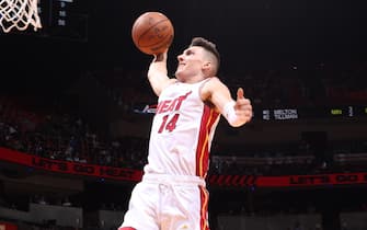 MEMPHIS, TN - DECEMBER 6: Tyler Herro #14 of the Miami Heat dunks the ball against the Memphis Grizzlies on December 6, 2021 at FTX Arena in Miami, Florida. NOTE TO USER: User expressly acknowledges and agrees that, by downloading and or using this photograph, User is consenting to the terms and conditions of the Getty Images License Agreement. Mandatory Copyright Notice: Copyright 2021 NBAE (Photo by Joe Murphy/NBAE via Getty Images)