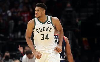 HOUSTON, TEXAS - DECEMBER 10: Giannis Antetokounmpo #34 of the Milwaukee Bucks reacts after scoring on a fast break during the fourth quarter against the Houston Rockets at Toyota Center on December 10, 2021 in Houston, Texas. NOTE TO USER: User expressly acknowledges and agrees that, by downloading and or using this photograph, User is consenting to the terms and conditions of the Getty Images License Agreement. (Photo by Bob Levey/Getty Images)