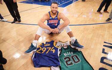 NEW YORK, NY - DECEMBER 14: Stephen Curry #30 of the Golden State Warriors poses for a photo with custom 2,974 three-points made jersey, the jersey of Reggie Miller, and the jersey of Ray Allen on December 14, 2021 at Madison Square Garden in New York, New York. NOTE TO USER: User expressly acknowledges and agrees that, by downloading and/or using this Photograph, user is consenting to the terms and conditions of the Getty Images License Agreement. Mandatory Copyright Notice: Copyright 2021 NBAE (Photo by Jesse D. Garrabrant/NBAE via Getty Images) 