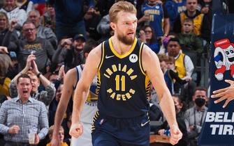 INDIANAPOLIS, IN - DECEMBER 13: Domantas Sabonis #11 of the Indiana Pacers reacts to a play during the game against the Golden State Warriors on December 13, 2021 at Gainbridge Fieldhouse in Indianapolis, Indiana. NOTE TO USER: User expressly acknowledges and agrees that, by downloading and or using this Photograph, user is consenting to the terms and conditions of the Getty Images License Agreement. Mandatory Copyright Notice: Copyright 2021 NBAE (Photo by Ron Hoskins/NBAE via Getty Images)