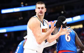 DENVER, CO - DECEMBER 13: Nikola Jokic #15 of the Denver Nuggets reacts towards a referee during the third quarter against the Washington Wizards at Ball Arena on December 13, 2021 in Denver, Colorado. NOTE TO USER: User expressly acknowledges and agrees that, by downloading and or using this photograph, User is consenting to the terms and conditions of the Getty Images License Agreement. (Photo by C. Morgan Engel/Getty Images)