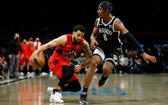 NEW YORK, NEW YORK - DECEMBER 14: Fred VanVleet #23 of the Toronto Raptors dribbles against David Duke Jr. #6 of the Brooklyn Nets during overtime at Barclays Center on December 14, 2021 in the Brooklyn borough of New York City. The Nets won 131-129. NOTE TO USER: User expressly acknowledges and agrees that, by downloading and or using this photograph, User is consenting to the terms and conditions of the Getty Images License Agreement. (Photo by Sarah Stier/Getty Images)