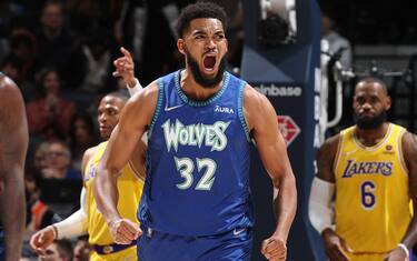 MINNEAPOLIS, MN -  DECEMBER 17: Karl-Anthony Towns #32 of the Minnesota Timberwolves celebrates during the game against the Los Angeles Lakers on December 17, 2021 at Target Center in Minneapolis, Minnesota. NOTE TO USER: User expressly acknowledges and agrees that, by downloading and or using this Photograph, user is consenting to the terms and conditions of the Getty Images License Agreement. Mandatory Copyright Notice: Copyright 2021 NBAE (Photo by David Sherman/NBAE via Getty Images)