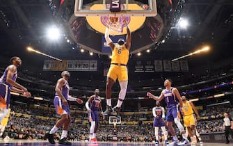 LOS ANGELES, CA - DECEMBER 21: LeBron James #6 of the Los Angeles Lakers dunks the ball during the game against the Phoenix Suns on December 21, 2021 at STAPLES Center in Los Angeles, California. NOTE TO USER: User expressly acknowledges and agrees that, by downloading and/or using this Photograph, user is consenting to the terms and conditions of the Getty Images License Agreement. Mandatory Copyright Notice: Copyright 2021 NBAE (Photo by Andrew D. Bernstein/NBAE via Getty Images) 