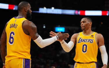 HOUSTON, TX - DECEMBER 28: LeBron James #6 and Russell Westbrook #0 of the Los Angeles Lakers embrace after the game against the Houston Rockets on December 28, 2021 at the Toyota Center in Houston, Texas. NOTE TO USER: User expressly acknowledges and agrees that, by downloading and or using this photograph, User is consenting to the terms and conditions of the Getty Images License Agreement. Mandatory Copyright Notice: Copyright 2021 NBAE (Photo by Cooper Neill/NBAE via Getty Images)