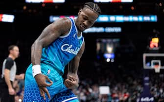 CHARLOTTE, NORTH CAROLINA - DECEMBER 27: Terry Rozier #3 of the Charlotte Hornets reacts after making a three point shot against the Houston Rockets in the third quarter during their game at Spectrum Center on December 27, 2021 in Charlotte, North Carolina. NOTE TO USER: User expressly acknowledges and agrees that, by downloading and or using this photograph, User is consenting to the terms and conditions of the Getty Images License Agreement. (Photo by Jacob Kupferman/Getty Images)
