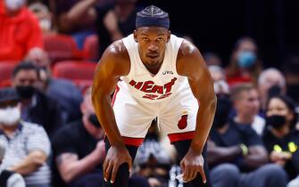 MIAMI, FLORIDA - DECEMBER 28: Jimmy Butler #22 of the Miami Heat looks on against the Washington Wizards during the first half at FTX Arena on December 28, 2021 in Miami, Florida. NOTE TO USER: User expressly acknowledges and agrees that, by downloading and or using this photograph, User is consenting to the terms and conditions of the Getty Images License Agreement.  (Photo by Michael Reaves/Getty Images)