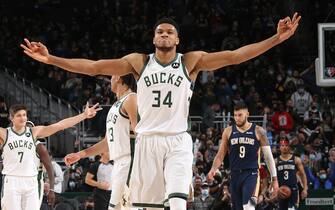 MILWAUKEE, WI - JANUARY 1: Giannis Antetokounmpo #34 of the Milwaukee Bucks celebrates after making a three-point basket against the New Orleans Pelicans during the NBA game at Fiserv Forum on January 1, 2022 in Milwaukee, Wisconsin. NOTE TO USER: User expressly acknowledges and agrees that, by downloading and/or using this photograph, user is consenting to the terms and conditions of the Getty Images License Agreement.  Mandatory Copyright Notice: Copyright 2022 NBAE (Photo by Gary Dineen/NBAE via Getty Images)