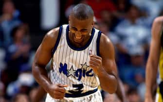ORLANDO - JUNE 4:  Dennis Scott #3 of the Orlando Magic pumps his fist in Game Seven of the Eastern Conference Finals during the 1995 NBA Playoffs against the Indiana Pacers at the Orlando Arena on June 4, 1995 in Orlando, Florida.  The Orlando Magic defeated the Indiana Pacers 105-81. NOTE TO USER: User expressly acknowledges and agrees that, by downloading and or using this photograph, User is consenting to the terms and conditions of the Getty Images License Agreement. Mandatory Copyright Notice: Copyright 1995 NBAE (Photo by Barry Gossage/NBAE via Getty Images)