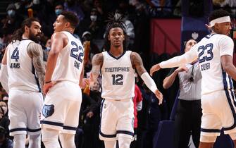 BROOKLYN, NY - JANUARY 3: Ja Morant #12 of the Memphis Grizzlies embraces teammates during the game against the Brooklyn Nets on January 3, 2022 at Barclays Center in Brooklyn, New York. NOTE TO USER: User expressly acknowledges and agrees that, by downloading and or using this Photograph, user is consenting to the terms and conditions of the Getty Images License Agreement. Mandatory Copyright Notice: Copyright 2022 NBAE (Photo by Nathaniel S. Butler/NBAE via Getty Images)