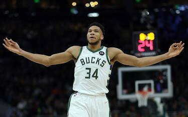 MILWAUKEE, WISCONSIN - JANUARY 13: Giannis Antetokounmpo #34 of the Milwaukee Bucks reacts to a three point shot during the second half of a game against the Golden State Warriors at Fiserv Forum on January 13, 2022 in Milwaukee, Wisconsin. NOTE TO USER: User expressly acknowledges and agrees that, by downloading and or using this photograph, User is consenting to the terms and conditions of the Getty Images License Agreement. (Photo by Stacy Revere/Getty Images)