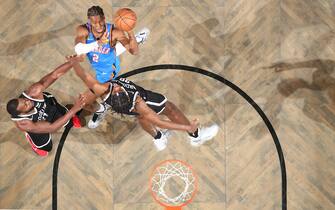 1237710894 BROOKLYN, NY - JANUARY 13: Shai Gilgeous-Alexander #2 of the Oklahoma City Thunder drives to the basket during the game against the Brooklyn Nets on January 13, 2022 at Barclays Center in Brooklyn, New York. NOTE TO USER: User expressly acknowledges and agrees that, by downloading and or using this Photograph, user is consenting to the terms and conditions of the Getty Images License Agreement. Mandatory Copyright Notice: Copyright 2022 NBAE (Photo by Nathaniel S. Butler/NBAE via Getty Images)