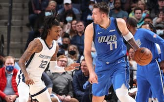 MEMPHIS, TN - JANUARY 14: Ja Morant #12 of the Memphis Grizzlies plays defense on Luka Doncic #77 of the Dallas Mavericks during the game on January 14, 2022 at FedExForum in Memphis, Tennessee. NOTE TO USER: User expressly acknowledges and agrees that, by downloading and or using this photograph, User is consenting to the terms and conditions of the Getty Images License Agreement. Mandatory Copyright Notice: Copyright 2022 NBAE (Photo by Joe Murphy/NBAE via Getty Images)