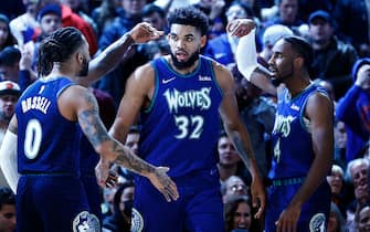 NEW YORK, NEW YORK - JANUARY 18: D'Angelo Russell #0, Karl-Anthony Towns #32, and Jaylen Nowell #4 of the Minnesota Timberwolves react during the second half against the New York Knicks at Madison Square Garden on January 18, 2022 in New York City. The Timberwolves won 112-110. NOTE TO USER: User expressly acknowledges and agrees that, by downloading and or using this photograph, User is consenting to the terms and conditions of the Getty Images License Agreement. (Photo by Sarah Stier/Getty Images)