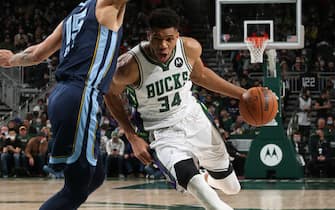MILWAUKEE, WI - JANUARY 19: Giannis Antetokounmpo #34 of the Milwaukee Bucks drives to the basket during the game against the Memphis Grizzlies on January 19, 2022 at the Fiserv Forum Center in Milwaukee, Wisconsin. NOTE TO USER: User expressly acknowledges and agrees that, by downloading and or using this Photograph, user is consenting to the terms and conditions of the Getty Images License Agreement. Mandatory Copyright Notice: Copyright 2022 NBAE (Photo by Gary Dineen/NBAE via Getty Images).