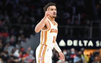 ATLANTA, GA - JANUARY 19: Trae Young #11 of the Atlanta Hawks reacts to a play during the game against the Minnesota Timberwolves on January 19, 2022 at State Farm Arena in Atlanta, Georgia.  NOTE TO USER: User expressly acknowledges and agrees that, by downloading and/or using this Photograph, user is consenting to the terms and conditions of the Getty Images License Agreement. Mandatory Copyright Notice: Copyright 2022 NBAE (Photo by Adam Hagy/NBAE via Getty Images)