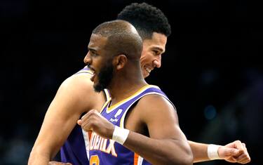 SAN ANTONIO, TX - JANUARY 17: Chris Paul #3 of the Phoenix Suns congratulates Devin Booker #1 of the Phoenix Suns after a basket against the San Antonio Spurs in the second half at AT&T Center on JANUARY 17, 2022 in San Antonio, Texas. NOTE TO USER: User expressly acknowledges and agrees that , by downloading and or using this photograph, User is consenting to the terms and conditions of the Getty Images License Agreement. (Photo by Ronald Cortes/Getty Images)