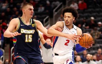 DETROIT, MI - JANUARY 25: Nikola Jokic #15 of the Denver Nuggets plays defense on Cade Cunningham #2 of the Detroit Pistons during the game on January 25, 2022 at Little Caesars Arena in Detroit, Michigan. NOTE TO USER: User expressly acknowledges and agrees that, by downloading and/or using this photograph, User is consenting to the terms and conditions of the Getty Images License Agreement. Mandatory Copyright Notice: Copyright 2022 NBAE (Photo by Brian Sevald/NBAE via Getty Images)