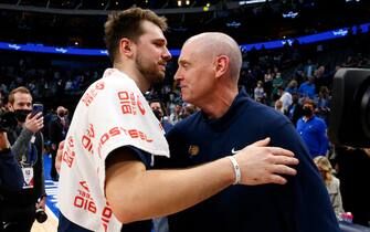 DALLAS, TEXAS - JANUARY 29: Luka Doncic #77 of the Dallas Mavericks hugs Rick Carlisle head coach of the Indiana Pacers after the game at American Airlines Center on January 29, 2022 in Dallas, Texas. NOTE TO USER: User expressly acknowledges and agrees that,  by downloading and or using this photograph,  User is consenting to the terms and conditions of the Getty Images License Agreement. (Photo by Richard Rodriguez/Getty Images)