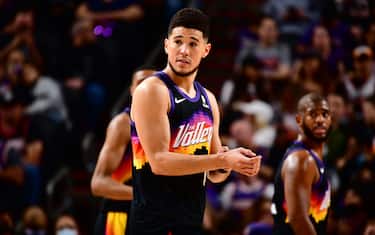 PHOENIX, AZ - JANUARY 30: Devin Booker #1 of the Phoenix Suns looks on during the game against the San Antonio Spurs on January 30, 2022 at Footprint Center in Phoenix, Arizona. NOTE TO USER: User expressly acknowledges and agrees that, by downloading and or using this photograph, user is consenting to the terms and conditions of the Getty Images License Agreement. Mandatory Copyright Notice: Copyright 2022 NBAE (Photo by Barry Gossage/NBAE via Getty Images)