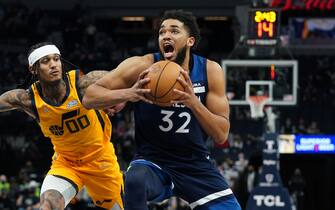 MINNEAPOLIS, MN -  JANUARY 30: Karl-Anthony Towns #32 of the Minnesota Timberwolves drives to the basket during the game against the Utah Jazz on January 30, 2022 at Target Center in Minneapolis, Minnesota. NOTE TO USER: User expressly acknowledges and agrees that, by downloading and or using this Photograph, user is consenting to the terms and conditions of the Getty Images License Agreement. Mandatory Copyright Notice: Copyright 2022 NBAE (Photo by Jordan Johnson/NBAE via Getty Images)