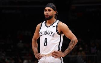 WASHINGTON, DC -Â  JANUARY 19: Patty Mills #8 of the Brooklyn Nets looks on during the game against the Washington Wizards on January 19, 2022 at Capital One Arena in Washington, DC. NOTE TO USER: User expressly acknowledges and agrees that, by downloading and or using this Photograph, user is consenting to the terms and conditions of the Getty Images License Agreement. Mandatory Copyright Notice: Copyright 2022 NBAE (Photo by Stephen Gosling/NBAE via Getty Images)