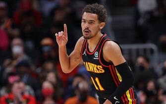 ATLANTA, GEORGIA - FEBRUARY 08:  Trae Young #11 of the Atlanta Hawks reacts after a basket against the Indiana Pacers during the first half at State Farm Arena on February 08, 2022 in Atlanta, Georgia.  NOTE TO USER: User expressly acknowledges and agrees that, by downloading and or using this photograph, User is consenting to the terms and conditions of the Getty Images License Agreement.  (Photo by Kevin C. Cox/Getty Images)