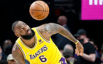PORTLAND, OREGON - FEBRUARY 09: LeBron James #6 of the Los Angeles Lakers watches a loose ball against the Portland Trail Blazers during the third quarter at Moda Center on February 09, 2022 in Portland, Oregon. NOTE TO USER: User expressly acknowledges and agrees that, by downloading and/or using this photograph, User is consenting to the terms and conditions of the Getty Images License Agreement. (Photo by Steph Chambers/Getty Images)