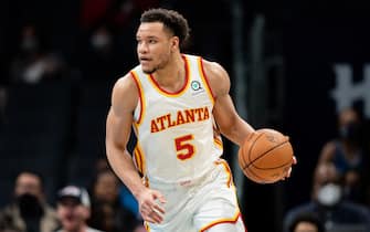 CHARLOTTE, NORTH CAROLINA - JANUARY 23: Kevin Knox II #5 of the Atlanta Hawks brings the ball up court against the Charlotte Hornets during their game at Spectrum Center on January 23, 2022 in Charlotte, North Carolina. NOTE TO USER: User expressly acknowledges and agrees that, by downloading and or using this photograph, User is consenting to the terms and conditions of the Getty Images License Agreement. (Photo by Jacob Kupferman/Getty Images)