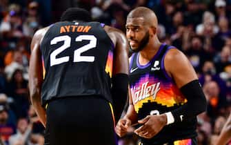 PHOENIX, AZ - FEBRUARY 10: Chris Paul #3 of the Phoenix Suns talks to Deandre Ayton #22 of the Phoenix Suns during the game against the Milwaukee Bucks on February 10, 2022 at Footprint Center in Phoenix, Arizona. NOTE TO USER: User expressly acknowledges and agrees that, by downloading and or using this photograph, user is consenting to the terms and conditions of the Getty Images License Agreement. Mandatory Copyright Notice: Copyright 2022 NBAE (Photo by Barry Gossage/NBAE via Getty Images)